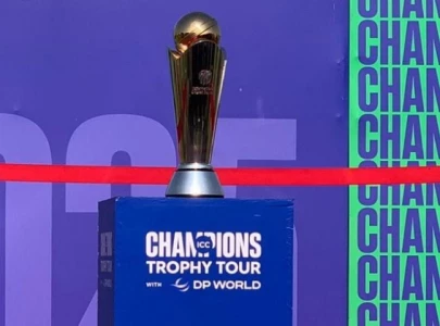 ICC Champions Trophy 2025 trophy displayed at Karachi's National Bank Stadium