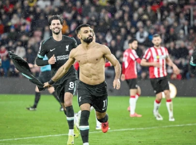 Salah sends Liverpool eight points clear