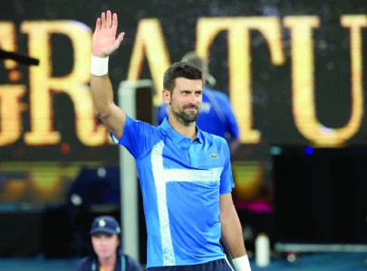 Record-setting Djokovic trumps Federer