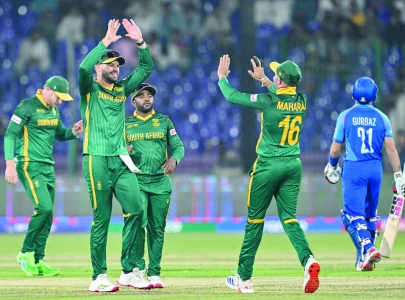 Rickelton century helps SA rout Afg