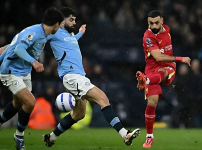 Man City vs Liverpool 0-2: Reds go 11 points clear as Salah makes more history